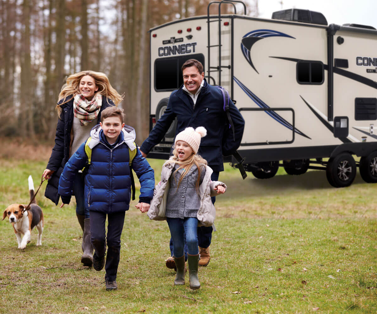 2018 Connect Lightweight Travel Trailer with Family Hiking Outdoors