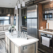 2019 KZ RV Durango Gold G366FBT Fifth Wheel Entertainment Center shown in Cascade decor