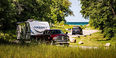 2020 KZ RV Connect C261RKK Travel Trailer being towed down road