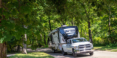 2020 KZ RV Durango D333RLT Fifth Wheel being towed down road