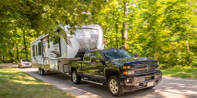 2020 KZ RV Durango Gold G391RKQ Fifth Wheel Exterior being towed down road