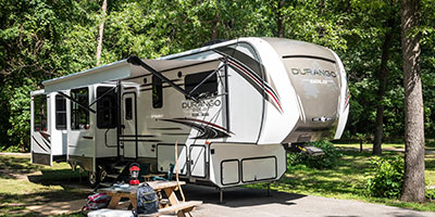 2020 KZ RV Durango Gold G391RKQ Fifth Wheel at campsite