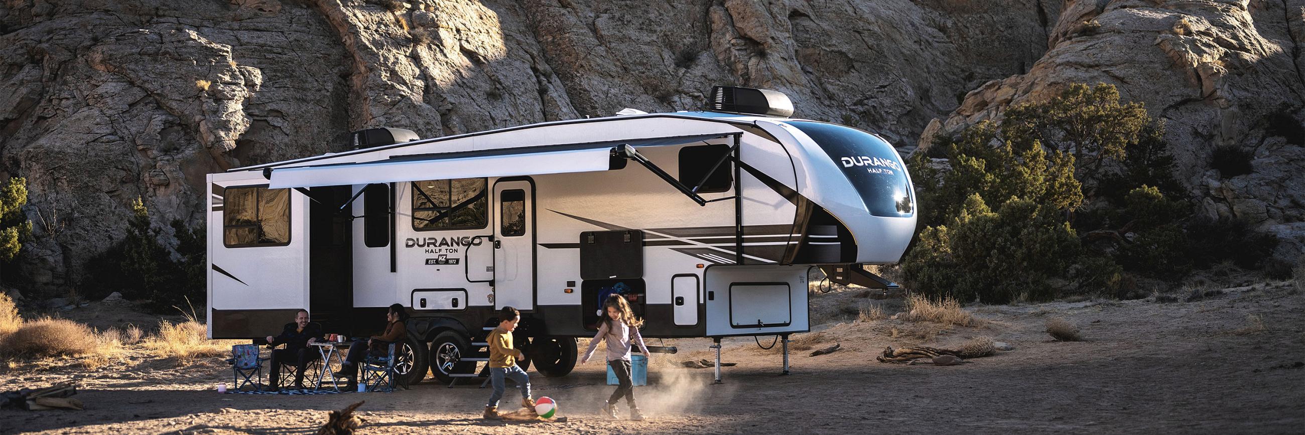 2021 KZ RV Durango Half-Ton D290RLT Fifth Wheel at Campsite