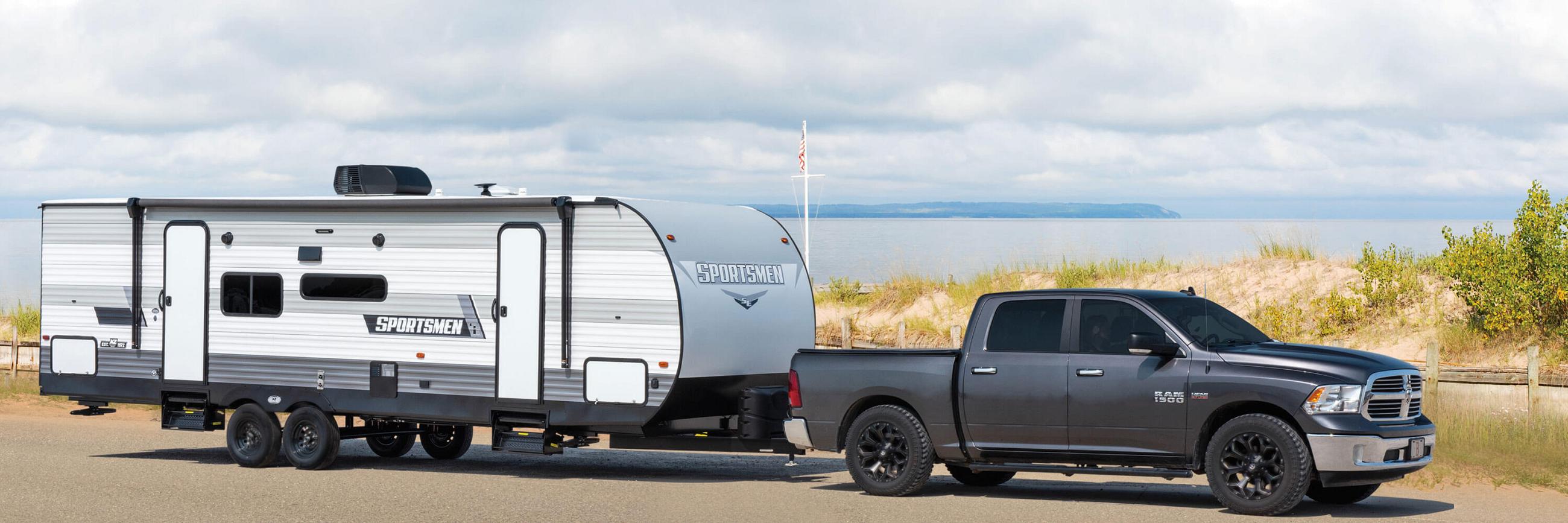 2021 KZ RV Sportsmen SE 281BHSE Travel Trailer being Towed by Truck