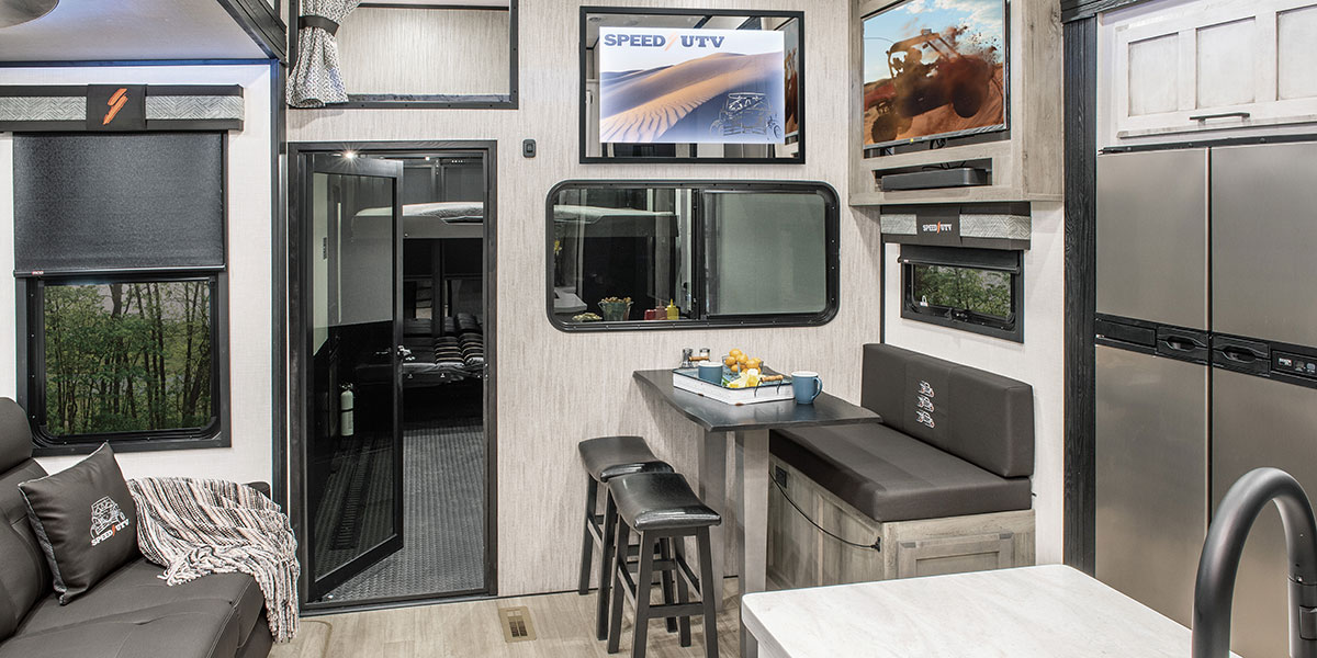 2023 KZ RV Robby Gordon Speed UTV Venom V-Series 3916RG Fifth Wheel Toy Hauler Living Room