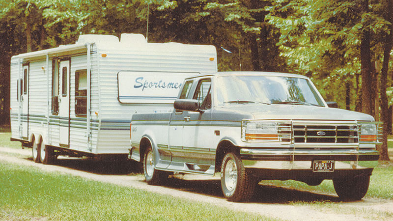 KZ RV 1997 Sportsmen Travel Trailer Hitched to Truck