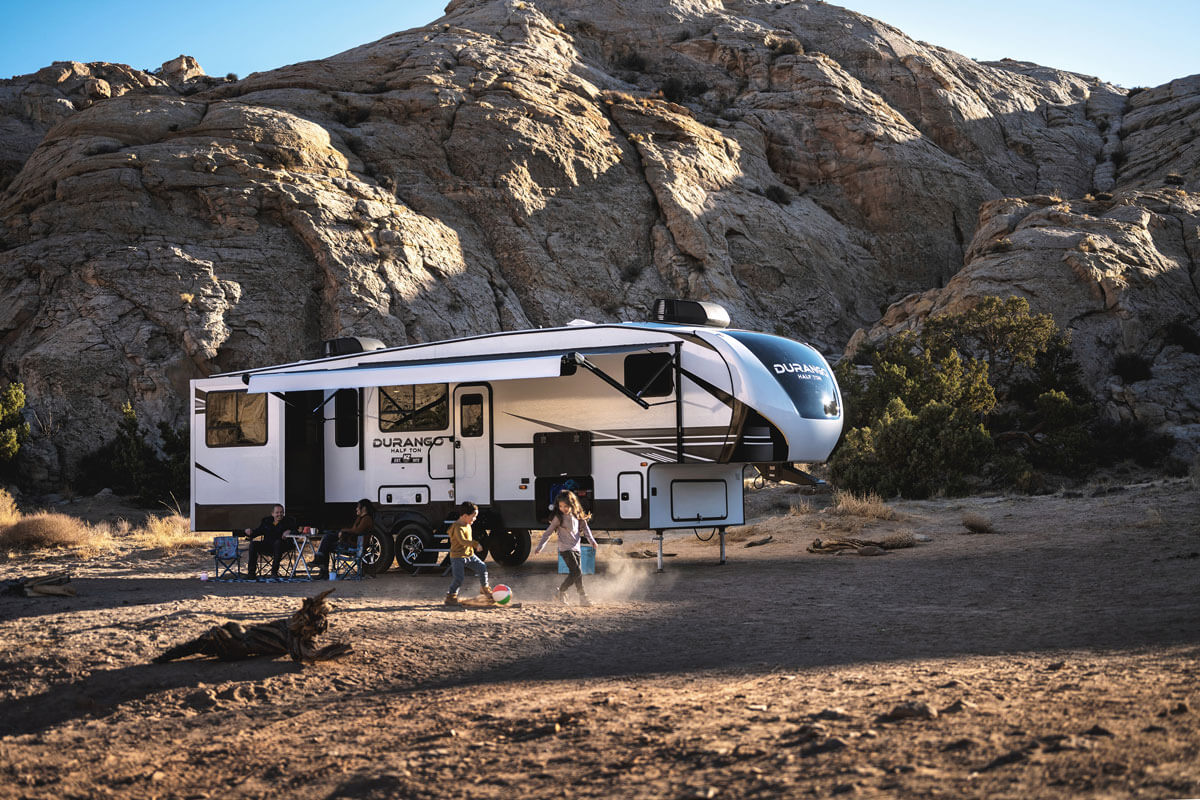 KZ RV Durango Half Ton D290RLT Fifth Wheel at Campsite